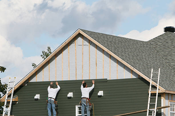 Professional Emergency Siding Repair technician working in Oxford, MD